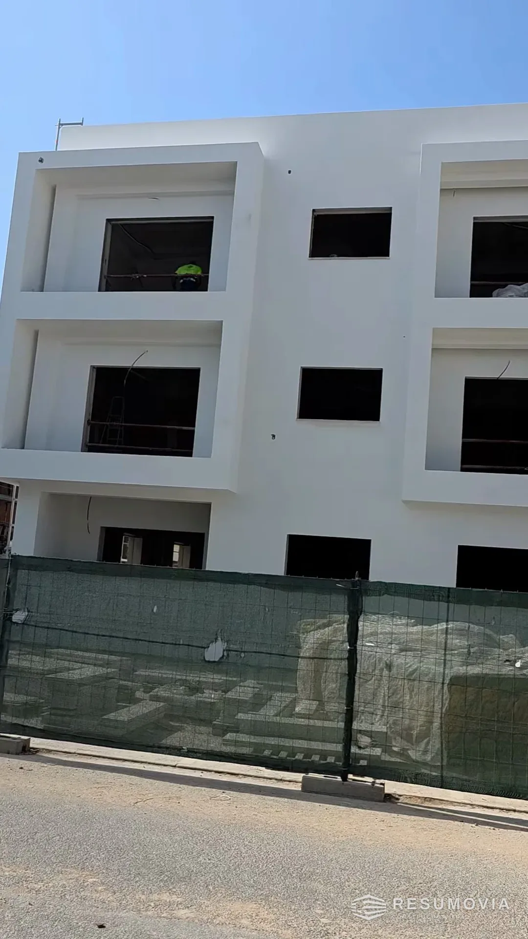 The framed openings on all three floors